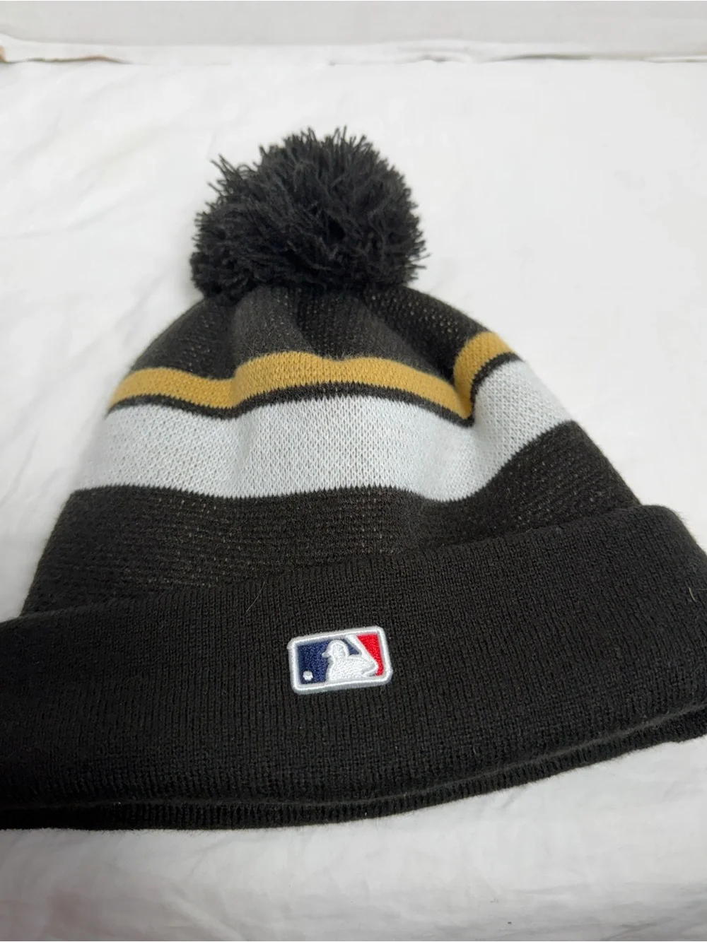 New Era Los Angeles Dodgers Black, White & Gold 2024 Champions Pom Beanie